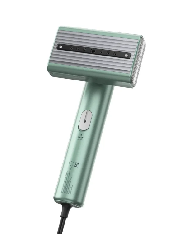 Mint green handheld garment steamer with steam vents.