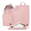 Pink Epicka travel packing cubes, shoe bag, and drawstring pouch.