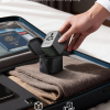 pulse-duo-65w-compact-travel-adapter-with-bag Compact Epicka 65W universal travel adapter with carrying bag in a suitcase